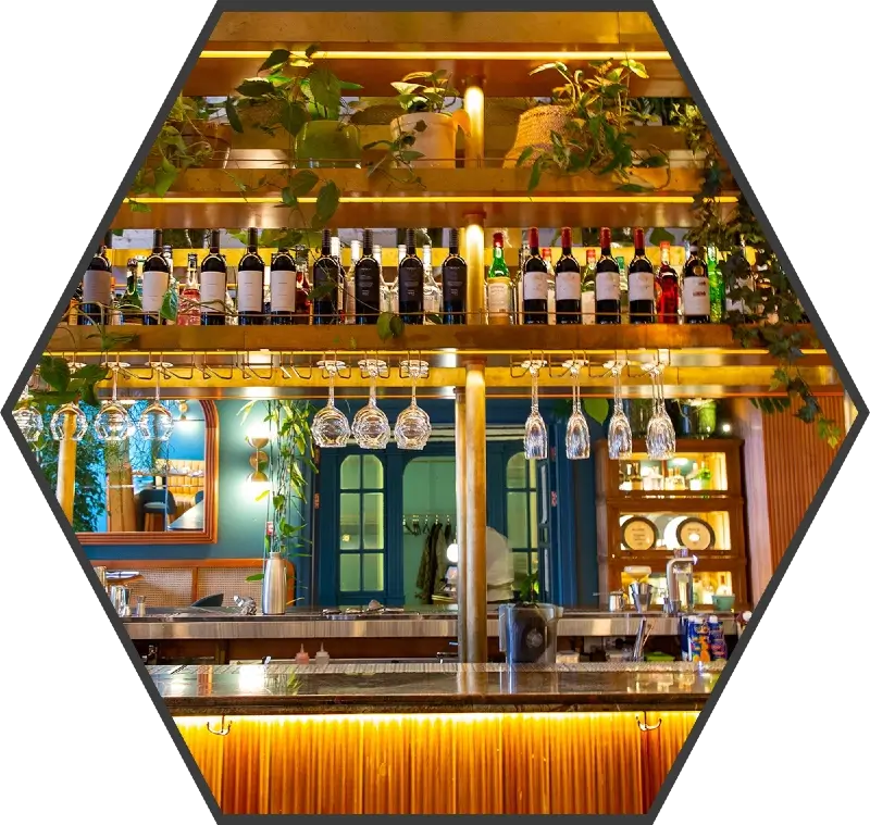 a vibrant bar with a golden and teal colour pallet